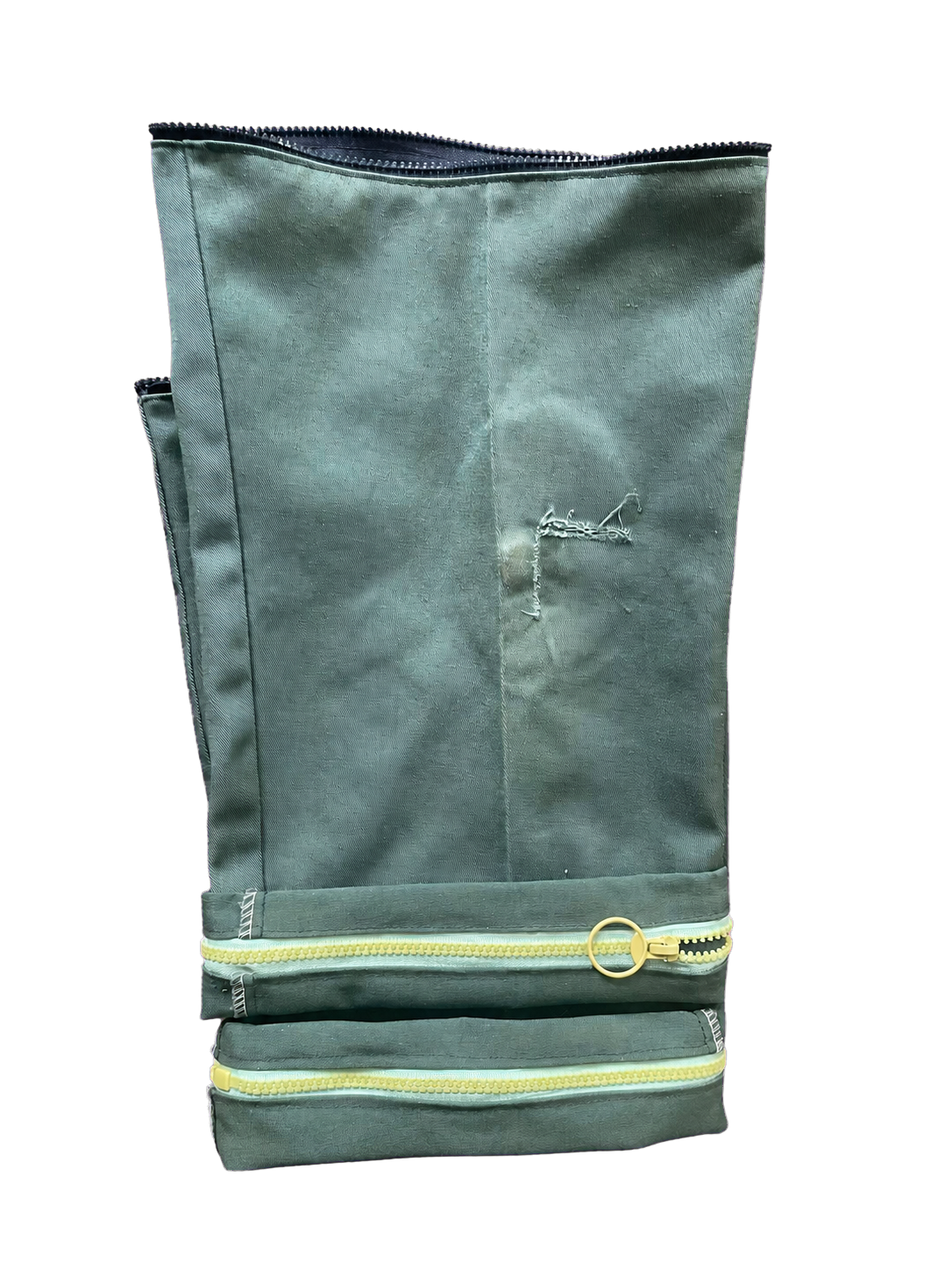 Close view of the zipper construction and distressed fabric on Cuffed King