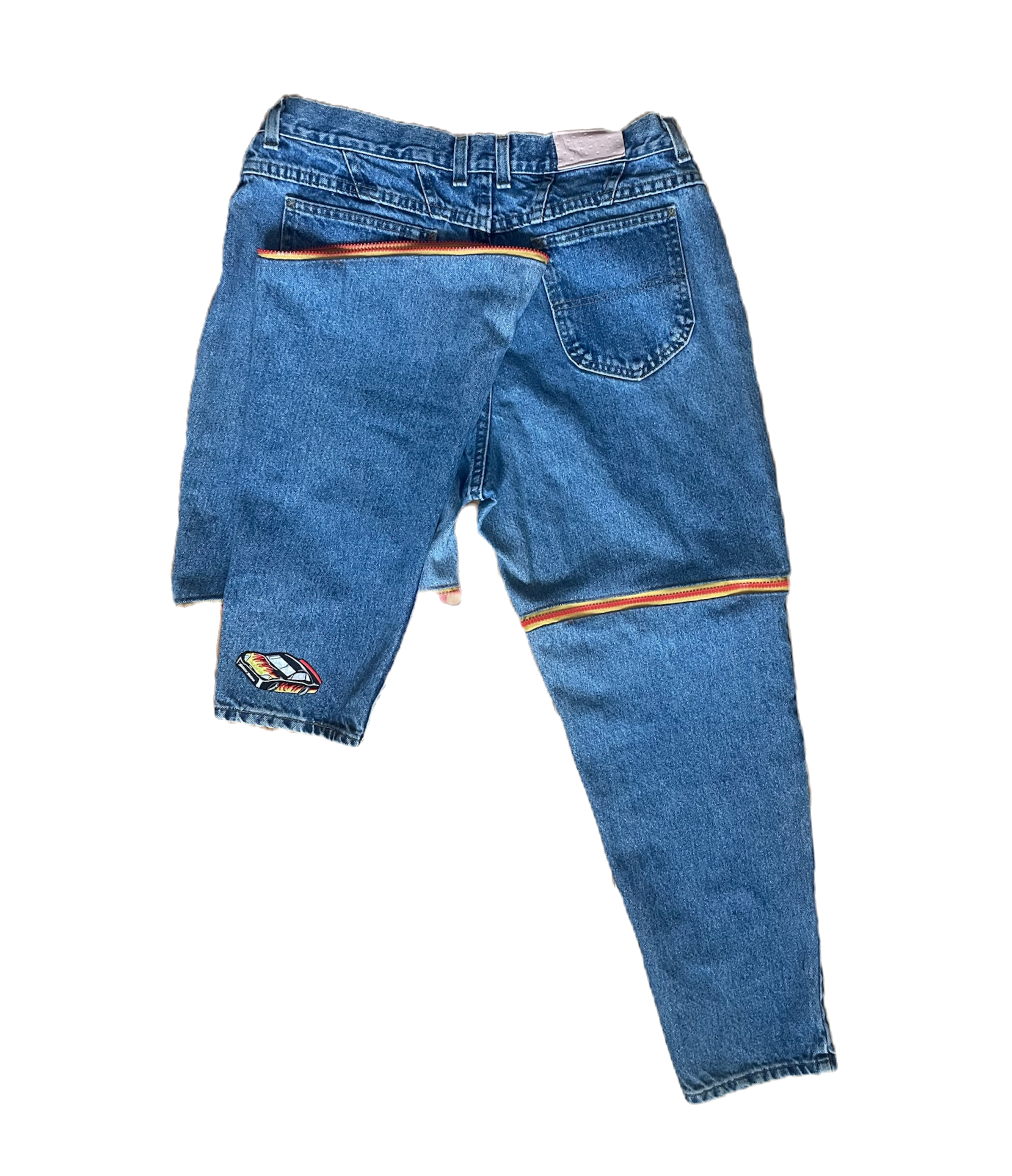Back view of Racers with one lower leg unzipped